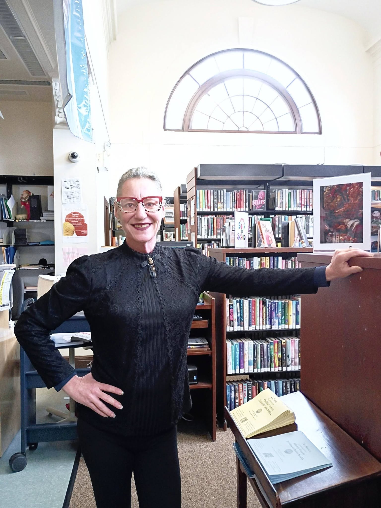 Collette in the library where she leads literacy and technology programs